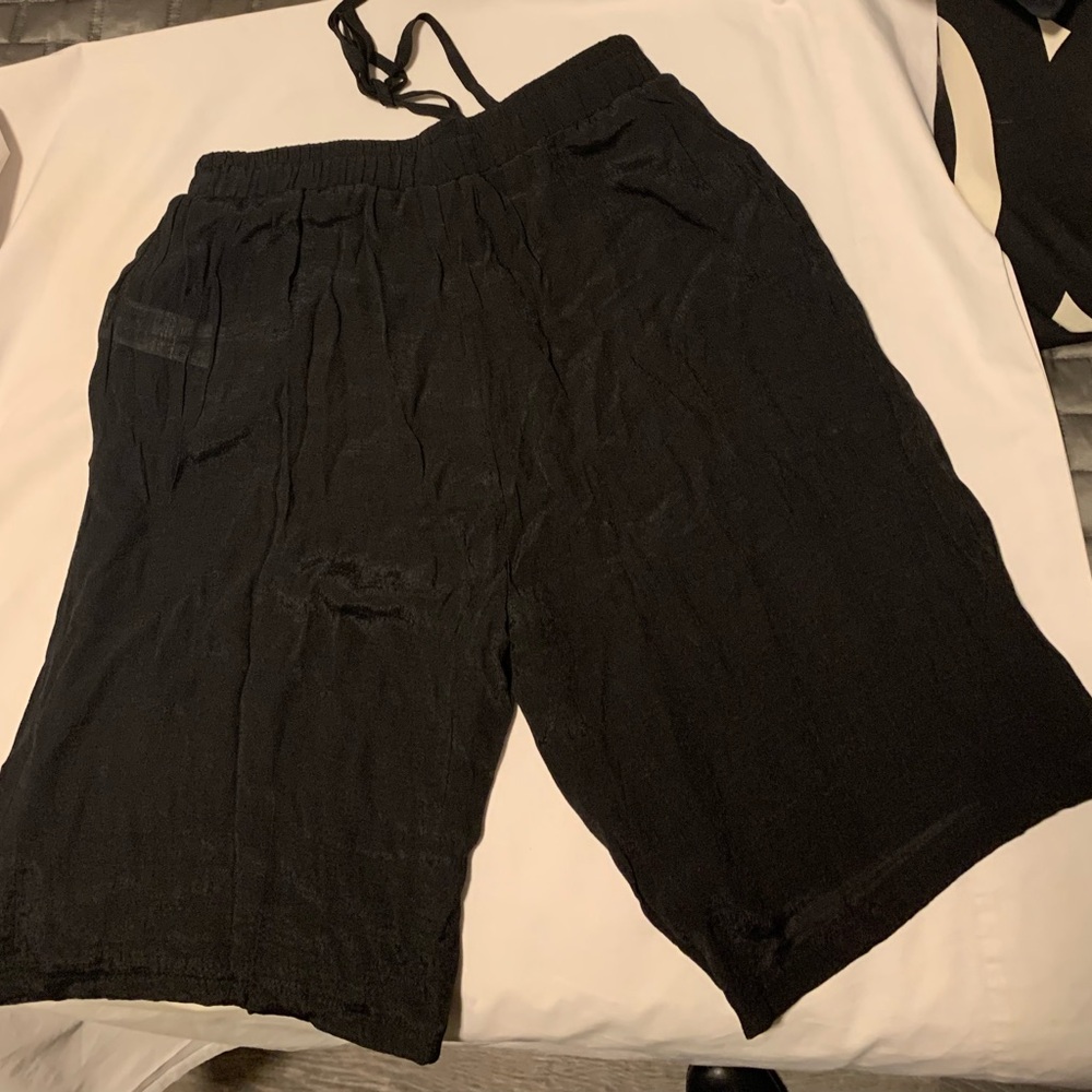 SHEIN, NEW,women, Black Athletic Shorts.
Thin fabric , size L